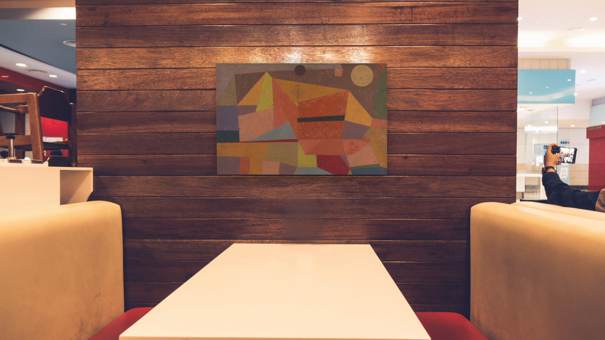 Heitere Gebirgslandschaft (Joyful Mountain Landscape) by Paul Klee, shown at 28 × 42 in (71.1 × 106.7 cm) as gallery-wrapped canvas, restaurant