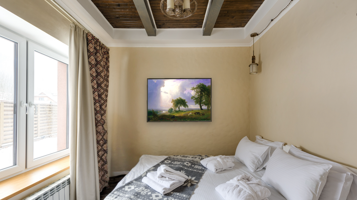 California Spring by Albert Bierstadt, shown at 28 × 42 in (71.1 × 106.7 cm) on canvas in Ramino Satin Black, hotel guest room