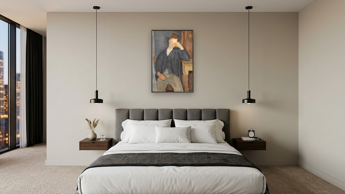 The Young Apprentice by Amedeo Modigliani, shown at 28 × 42 in (71.1 × 106.7 cm) on canvas in Ramino Satin Black, hotel guest room