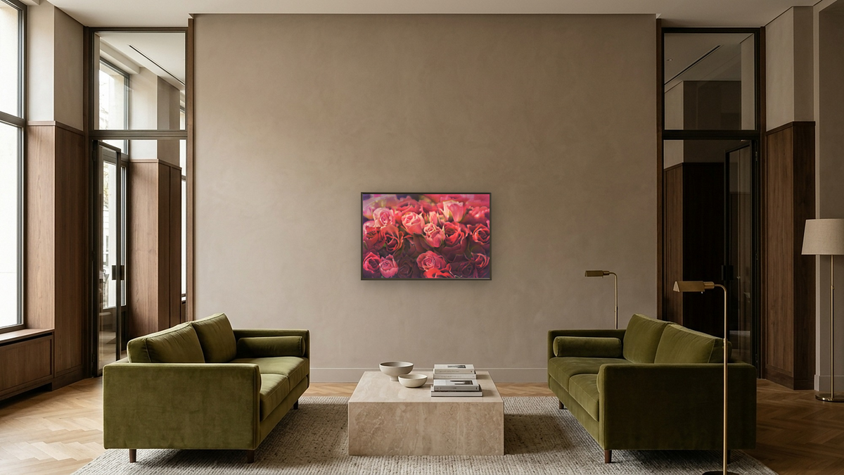 Pink Roses by Kirsten Söderlind, shown at 28 × 42 in (71.1 × 106.7 cm) on canvas in Ramino Satin Black, hotel lobby
