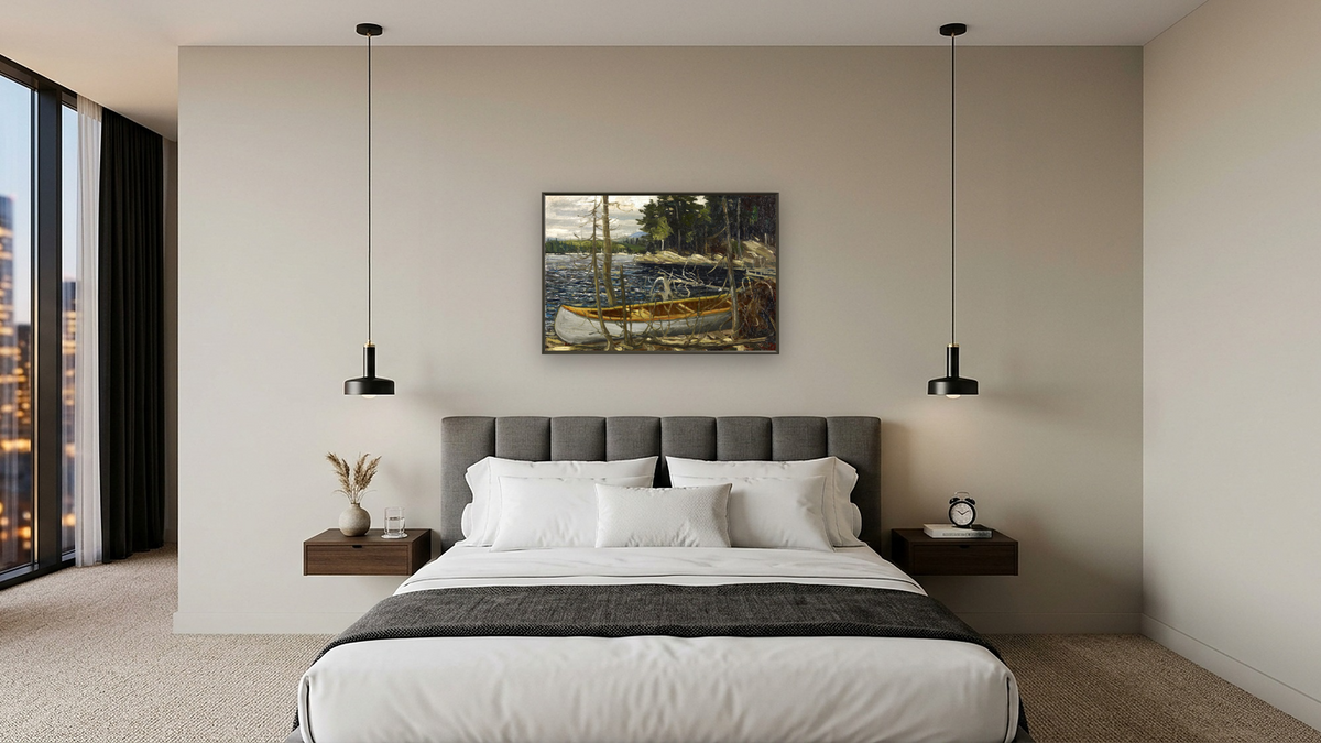 The Canoe by Tom Thomson, shown at 28 × 42 in (71.1 × 106.7 cm) on canvas in Ramino Satin Black, hotel guest room