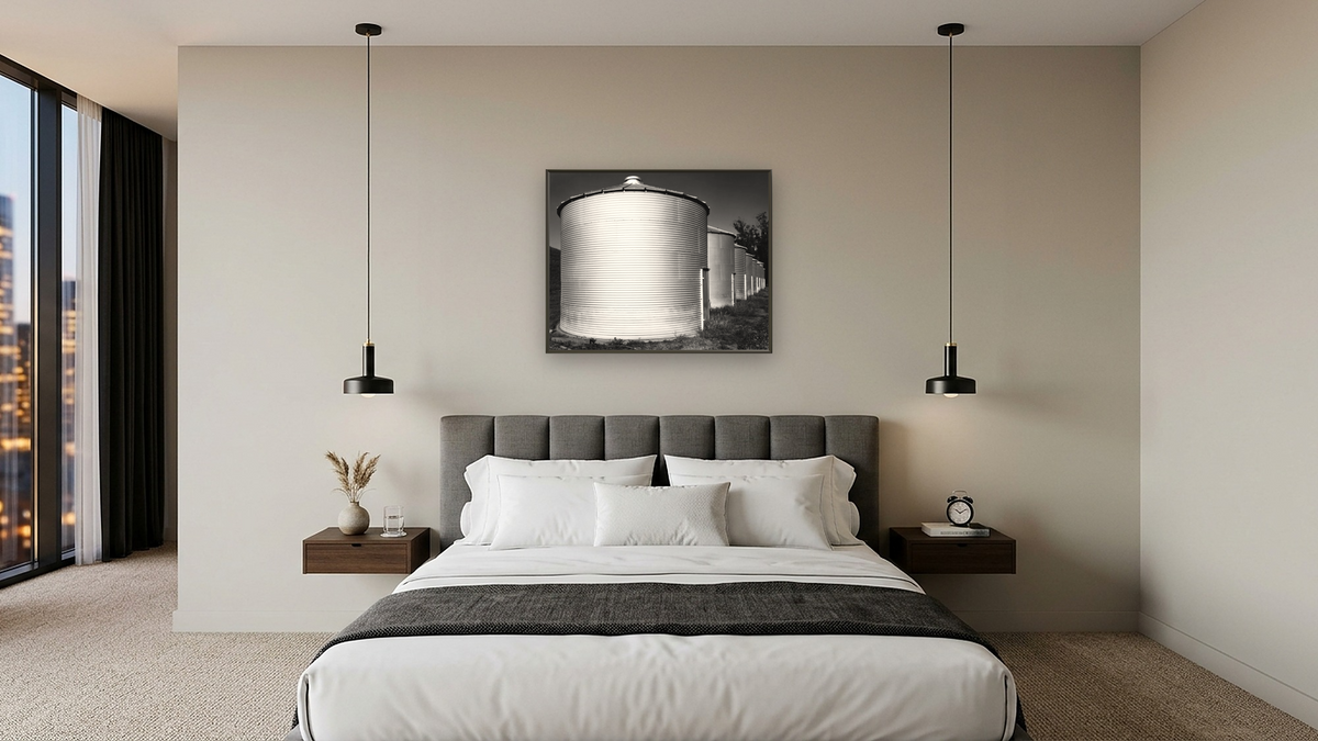 Butler Silos #1 by Gordon Osmundson, shown at 32 × 40 in (81.3 × 101.6 cm) on canvas in Ramino Satin Black, hotel guest room