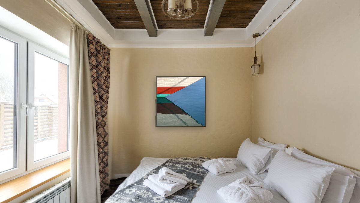 Convergence by Judith Rayl, shown at 32 × 32 in (81.3 × 81.3 cm) on canvas in Ramino Satin Black, hotel guest room