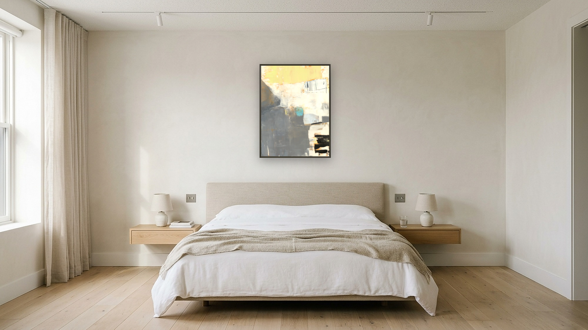 Blue Spot by Louise Gaskill, shown at 30 × 40 in (76.2 × 101.6 cm) on canvas in Ramino Satin Black, hotel guest room