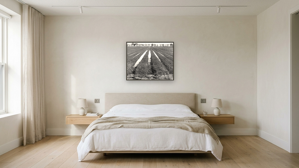 Rice Field by Gordon Osmundson, shown at 32 × 40 in (81.3 × 101.6 cm) on canvas in Ramino Satin Black, hotel guest room
