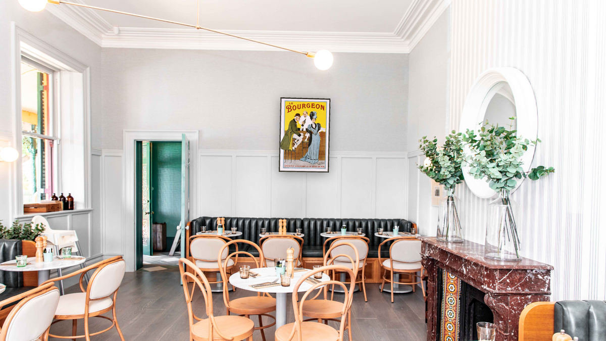 Le Bourgeon Poster by Robert Allouard, shown at 28 × 42 in (71.1 × 106.7 cm) on canvas in Ramino Satin Black, restaurant