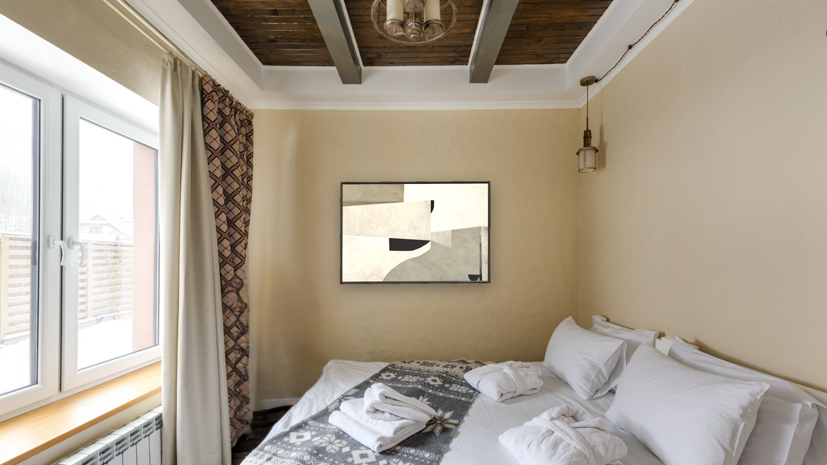 Priory by Dan Hobday, shown at 28 × 42 in (71.1 × 106.7 cm) on canvas in Ramino Satin Black, hotel guest room