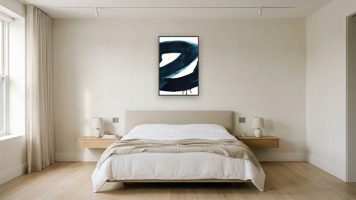 Brush Strokes 2 by Dan Hobday, shown at 28 × 42 in (71.1 × 106.7 cm) on canvas in Ramino Satin Black, hotel guest room