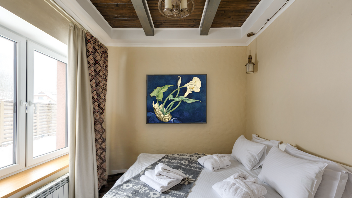 Calla Lilies (Bert Savoy) by Charles Demuth, shown at 32 × 40 in (81.3 × 101.6 cm) on canvas in Ramino Satin Black, hotel guest room