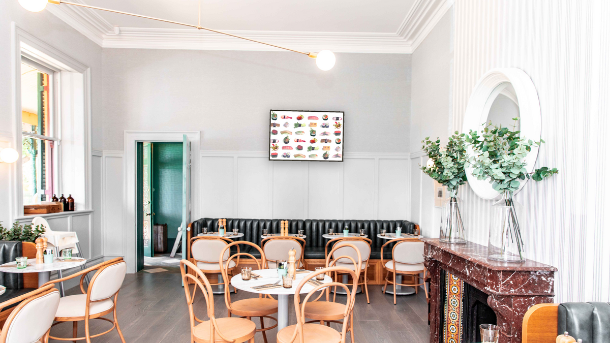 Sushi Pattern by Kirsten Söderlind, shown at 28 × 42 in (71.1 × 106.7 cm) on canvas in Ramino Satin Black, restaurant