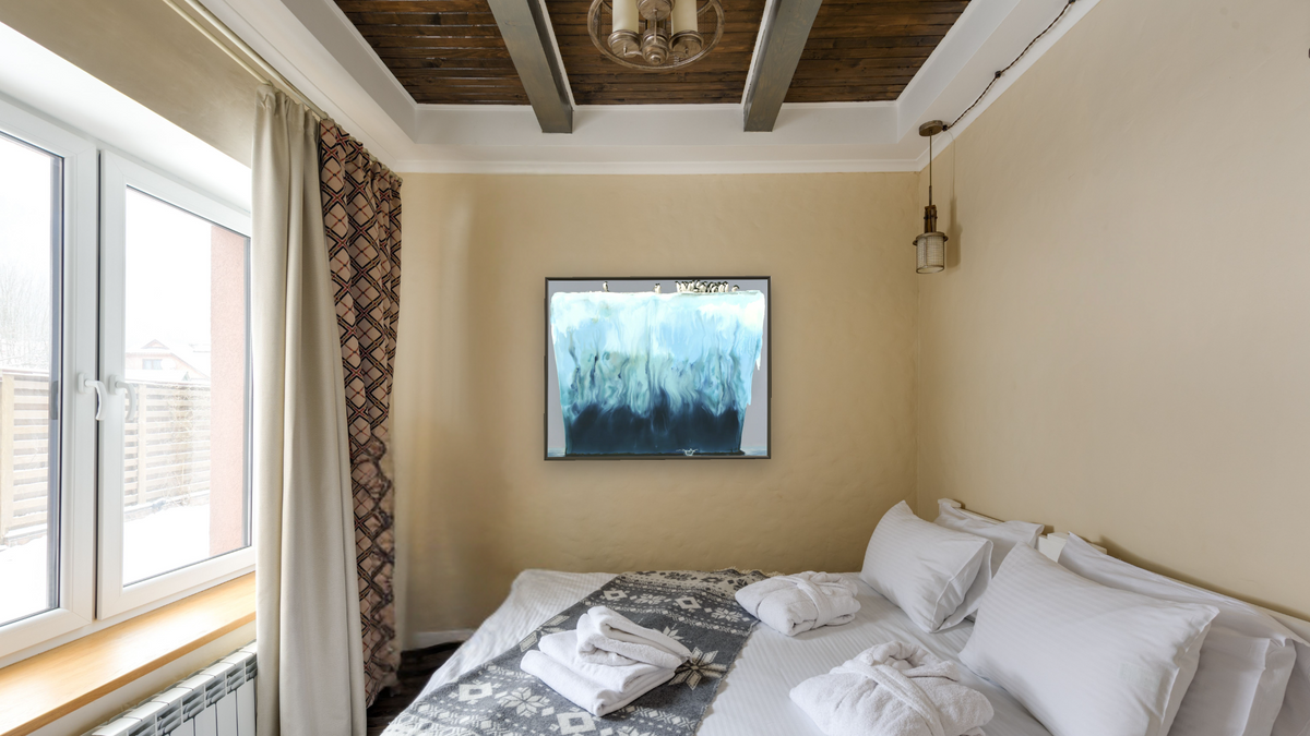 Adelies by Alexis Rockman, shown at 32 × 40 in (81.3 × 101.6 cm) on canvas in Ramino Satin Black, hotel guest room