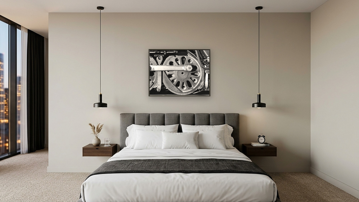 Rear Driver, AT&SF #3751 from the Railroad Series by Gordon Osmundson, shown at 30 × 40 in (76.2 × 101.6 cm) on canvas in Ramino Satin Black, hotel guest room