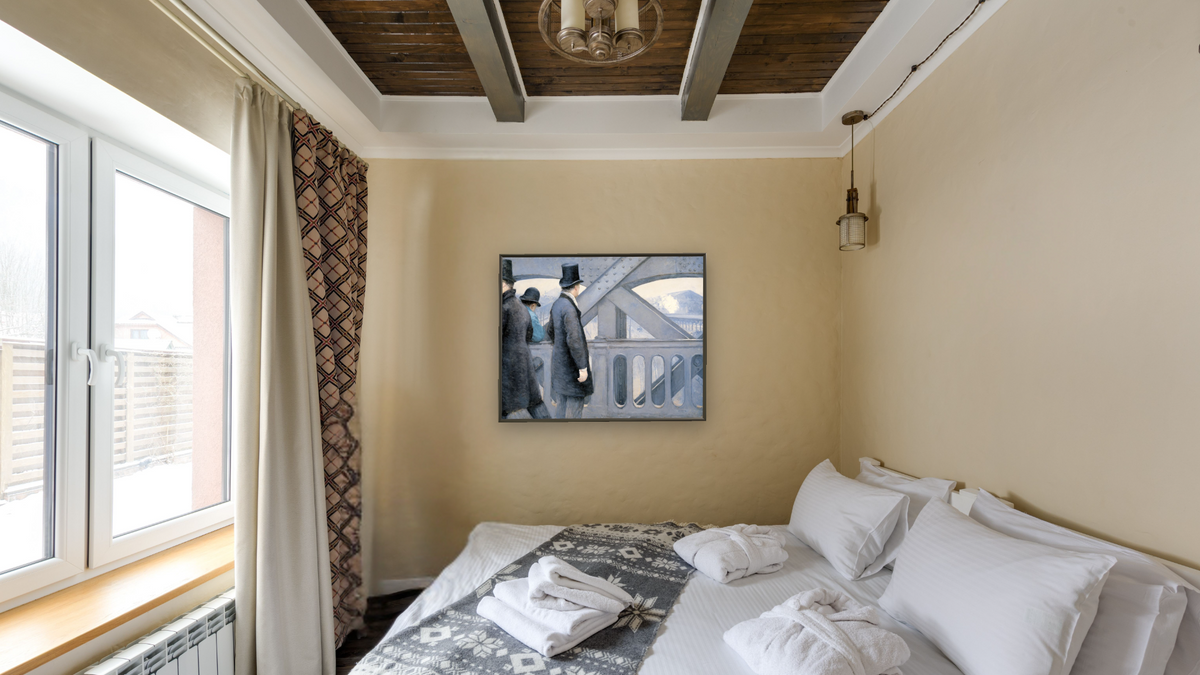 On the Pont de l'Europe by Gustave Caillebotte, shown at 32 × 40 in (81.3 × 101.6 cm) on canvas in Ramino Satin Black, hotel guest room