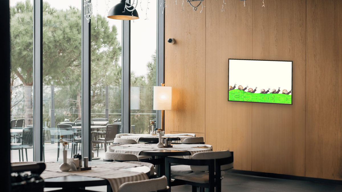 Biggest House In The World II by Leo Lionni, shown at 28 × 42 in (71.1 × 106.7 cm) on canvas in Ramino Satin Black, restaurant