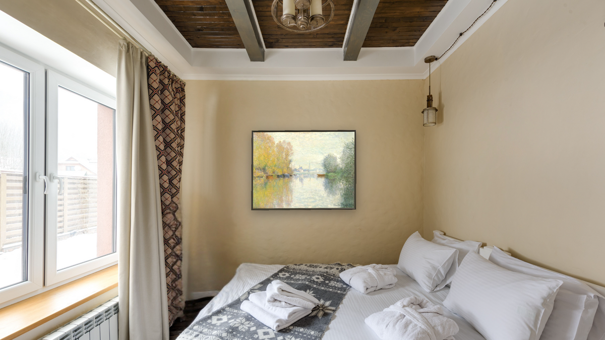 Autumn on the Seine, Argenteuil (Automne sur la Seine, Argenteuil) by Claude Monet, shown at 30 × 40 in (76.2 × 101.6 cm) on canvas in Ramino Satin Black, hotel guest room