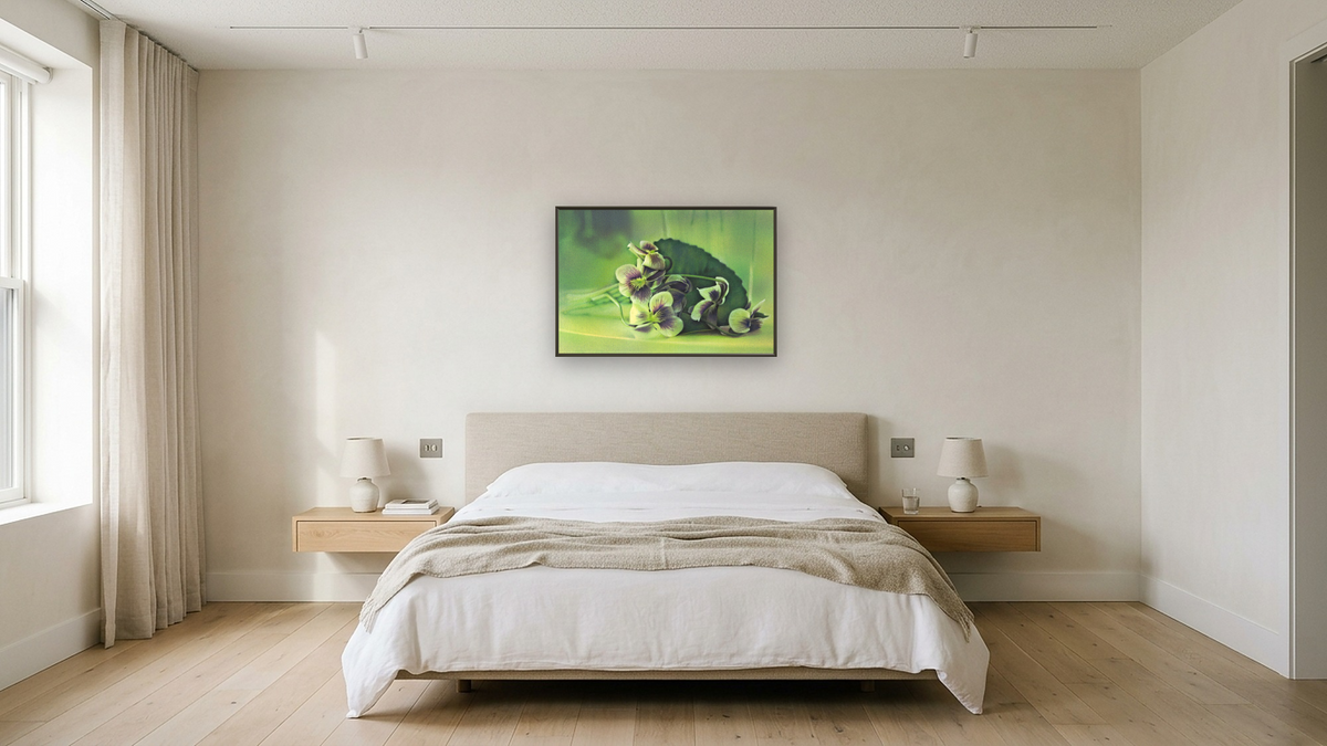 Violets by Kirsten Söderlind, shown at 28 × 42 in (71.1 × 106.7 cm) on canvas in Ramino Satin Black, hotel guest room