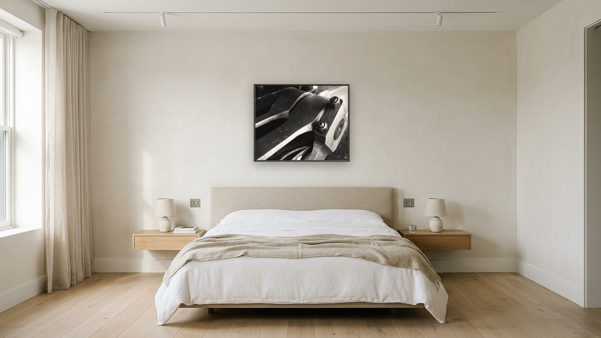 Oiled Rods, SP 2472 from the Railroad Series by Gordon Osmundson, shown at 32 × 40 in (81.3 × 101.6 cm) on canvas in Ramino Satin Black, hotel guest room