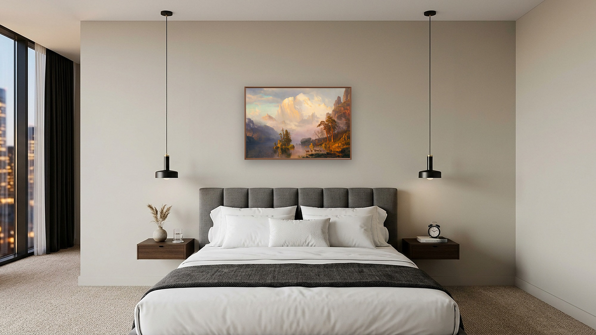 Rocky Mountains by Albert Bierstadt, shown at 28 × 42 in (71.1 × 106.7 cm) on canvas in Arber Warm Walnut, hotel guest room