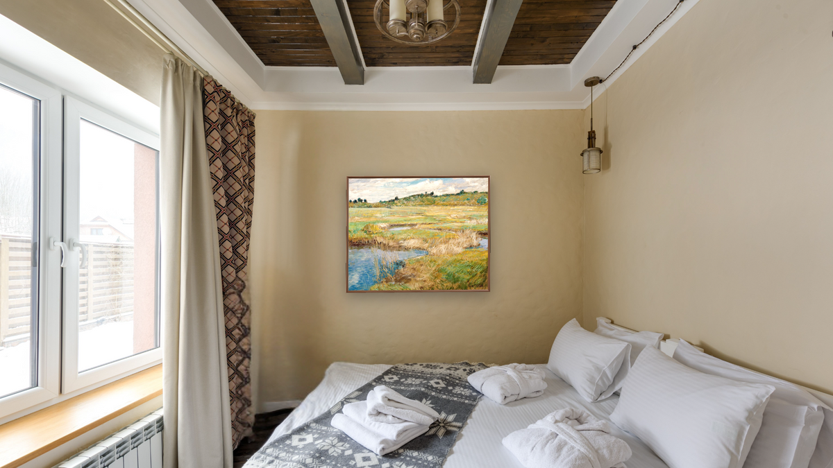 The Concord Meadow, Concord, Massachusetts by Childe Hassam, shown at 32 × 40 in (81.3 × 101.6 cm) on canvas in Arber Warm Walnut, hotel guest room
