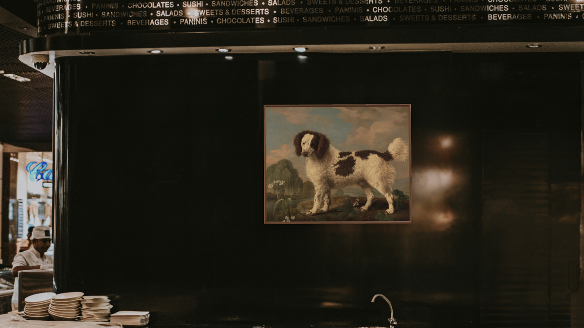 Brown and White Norfolk or Water Spaniel by George Stubbs, shown at 32 × 40 in (81.3 × 101.6 cm) on canvas in Arber Warm Walnut, restaurant