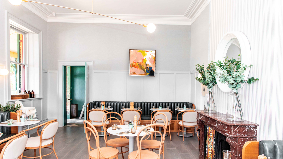 Snack 15 by Nino Yuniardi, shown at 32 × 32 in (81.3 × 81.3 cm) on canvas in Arber Warm Walnut, restaurant