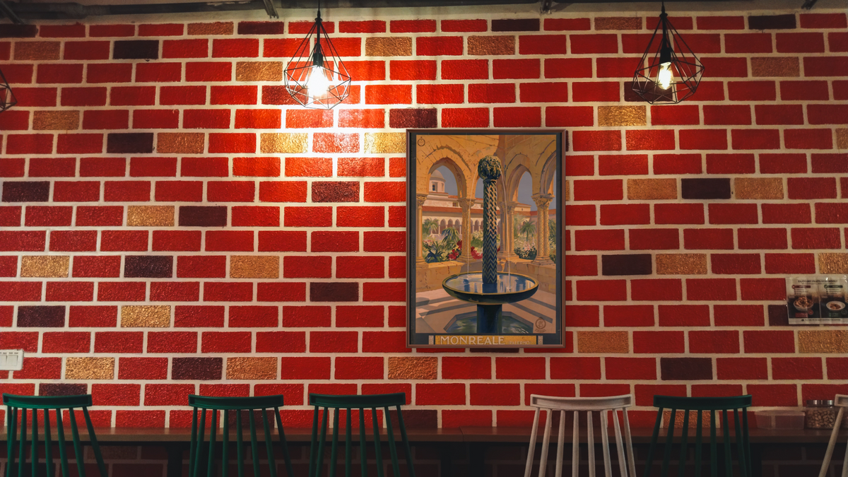 BPL Travel Posters, shown at 30 × 40 in (76.2 × 101.6 cm) on canvas in Arber Warm Walnut, restaurant