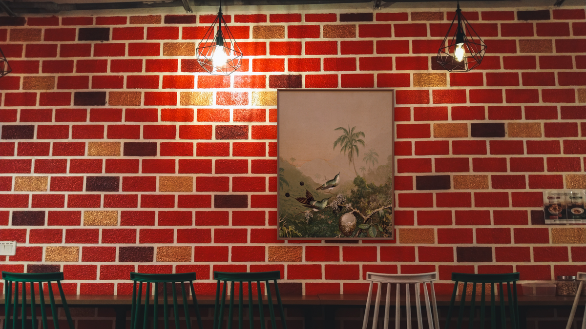 Brazilian Hummingbirds II by Martin Johnson Heade, shown at 32 × 40 in (81.3 × 101.6 cm) on canvas in Arber Warm Walnut, restaurant