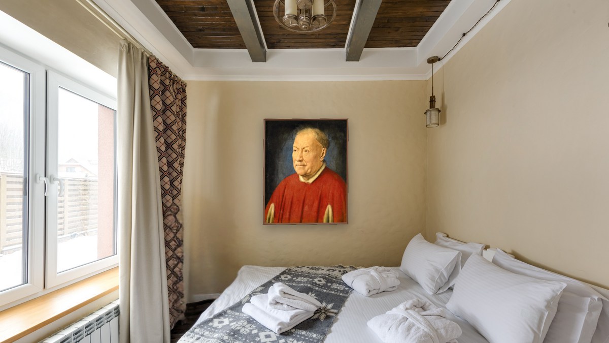 Cardinal Niccolò Albergati by Jan van Eyck, shown at 32 × 40 in (81.3 × 101.6 cm) on canvas in Arber Warm Walnut, hotel guest room