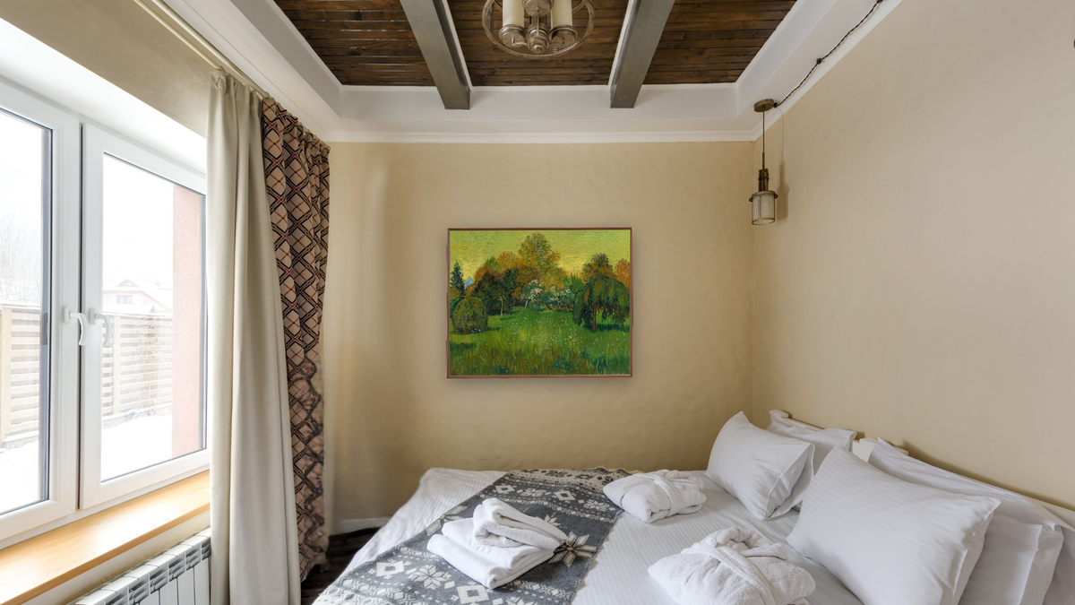 The Poet's Garden by Vincent van Gogh, shown at 32 × 40 in (81.3 × 101.6 cm) on canvas in Arber Warm Walnut, hotel guest room