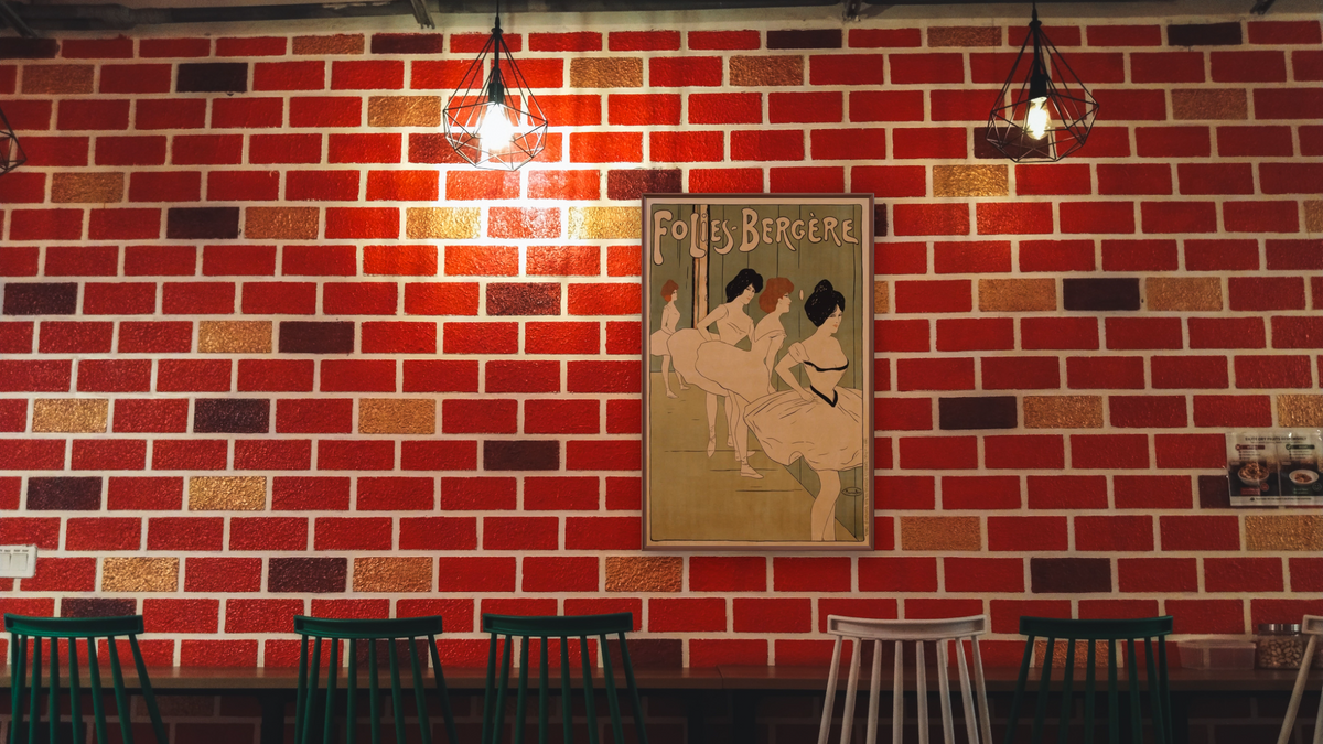 Folies-Bergere Poster by Maurice Biais, shown at 28 × 42 in (71.1 × 106.7 cm) on canvas in Arber Warm Walnut, restaurant