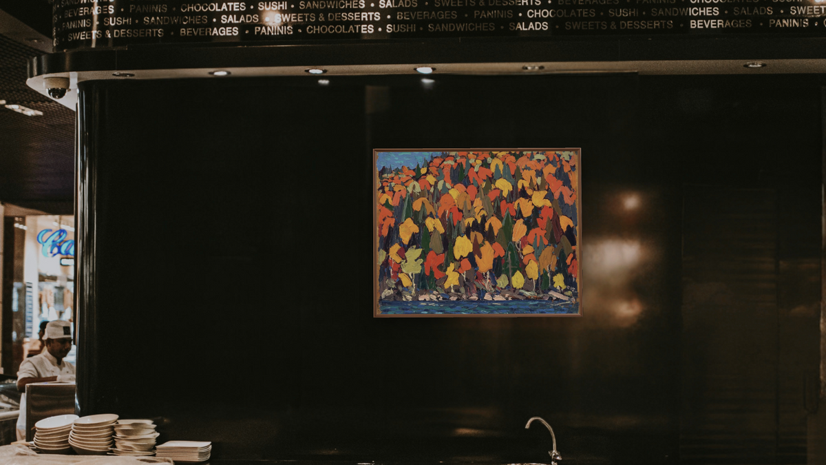 Autumn Foliage by Tom Thomson, shown at 32 × 40 in (81.3 × 101.6 cm) on canvas in Arber Warm Walnut, restaurant