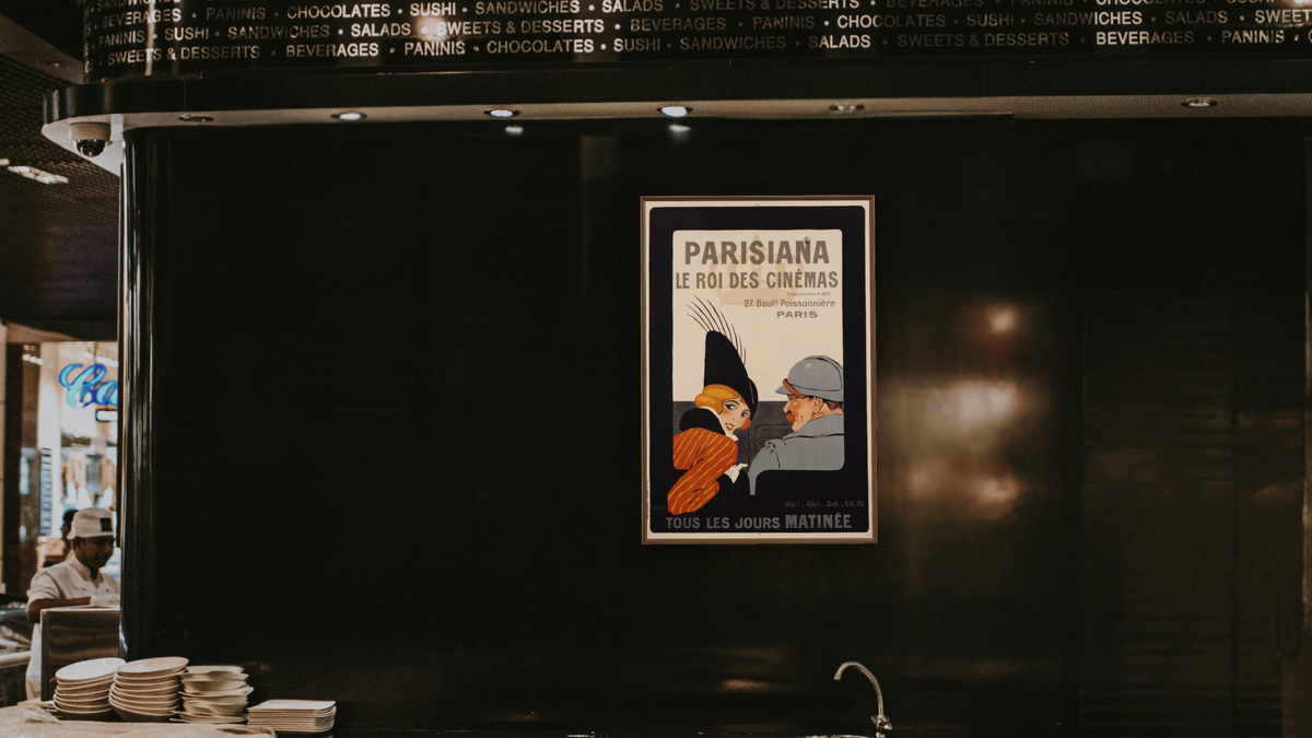 Parisiana Le Roi des Cinemas Poster by R. Pichon, shown at 28 × 42 in (71.1 × 106.7 cm) on canvas in Arber Warm Walnut, restaurant