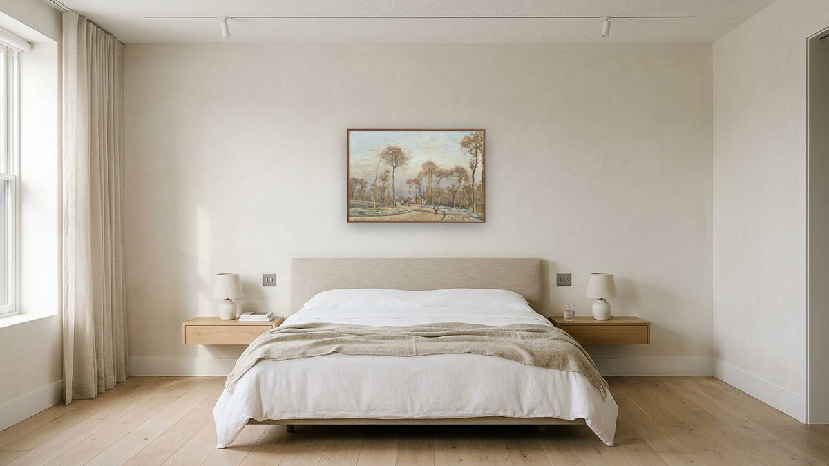 The Road to Versailles, Louveciennes: Morning Frost by Camille Pissarro, shown at 28 × 42 in (71.1 × 106.7 cm) on canvas in Arber Warm Walnut, hotel guest room