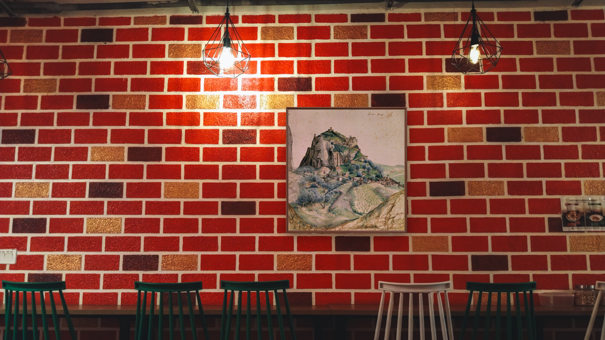 View of the Arco Valley in the Tyrol by Albrecht Dürer, shown at 32 × 32 in (81.3 × 81.3 cm) on canvas in Arber Warm Walnut, restaurant