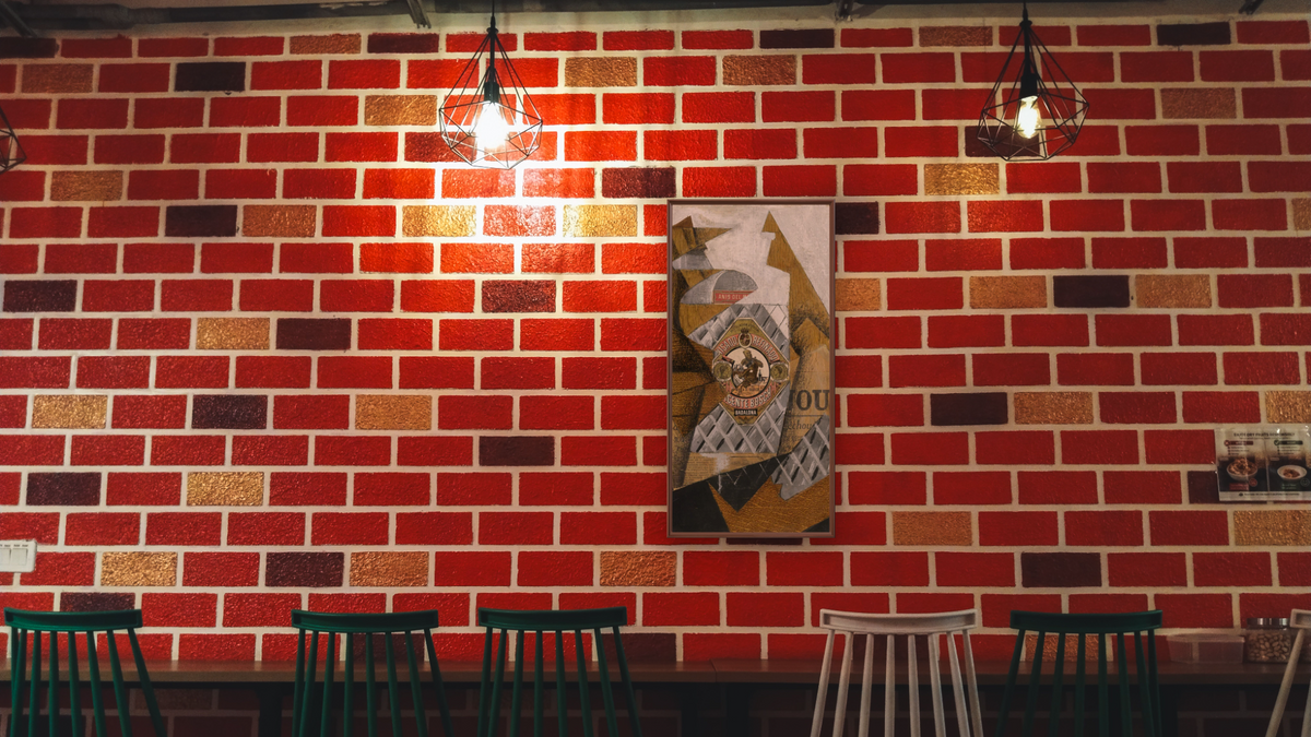 La Bouteille d'Anis (The Bottle of An’s del Mono) by Juan Gris, shown at 20 × 40 in (50.8 × 101.6 cm) on canvas in Arber Warm Walnut, restaurant