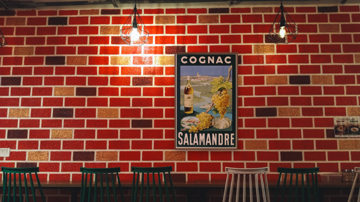 Cognac Salamandre Poster, shown at 28 × 42 in (71.1 × 106.7 cm) on canvas in Arber Warm Walnut, restaurant