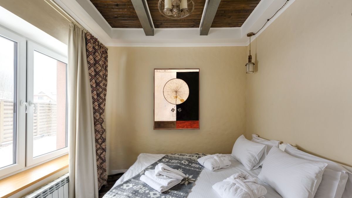 Series VII, No. 5 by Hilma af Klint, shown at 30 × 40 in (76.2 × 101.6 cm) on canvas in Arber Warm Walnut, hotel guest room