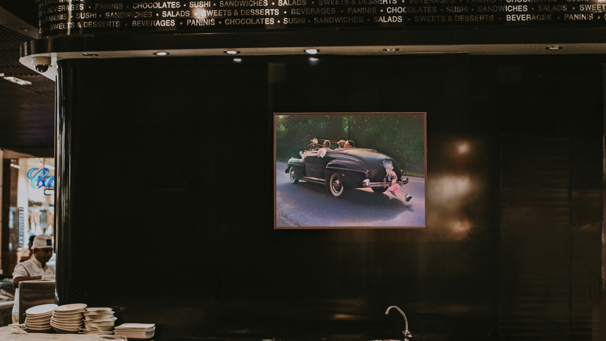 Wedding Getaway by Kirsten Söderlind, shown at 30 × 40 in (76.2 × 101.6 cm) on canvas in Arber Warm Walnut, restaurant