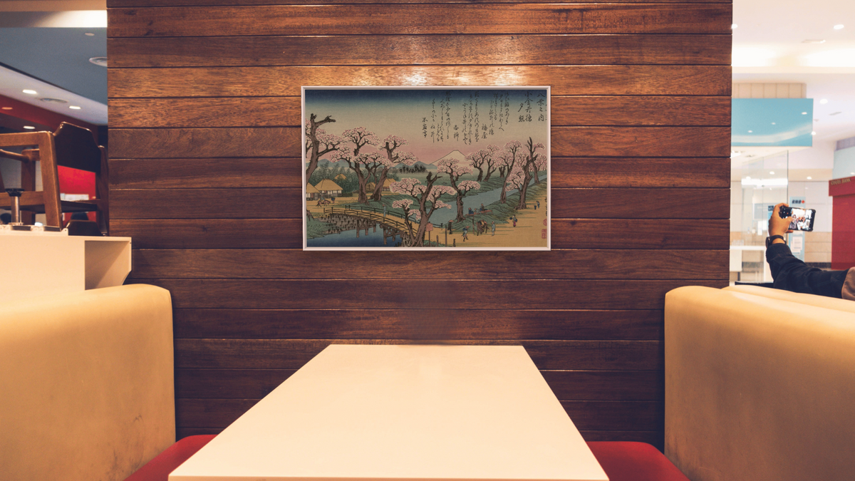 Evening Glow at Koganei Bridge by Andō Hiroshige, shown at 28 × 42 in (71.1 × 106.7 cm) on canvas in Ramino Opaque White, restaurant
