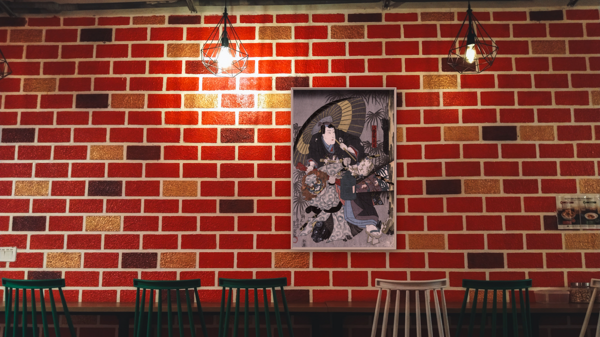 An actor in the role of Hachiman Taro Yoshiie by Utagawa Toyokuni, shown at 28 × 42 in (71.1 × 106.7 cm) on canvas in Ramino Opaque White, restaurant