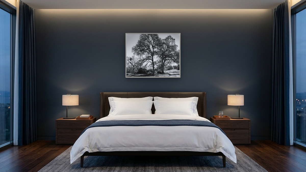 Three Oaks and Boulder by Gordon Osmundson, shown at 32 × 40 in (81.3 × 101.6 cm) on canvas in Ramino Opaque White, hotel guest room