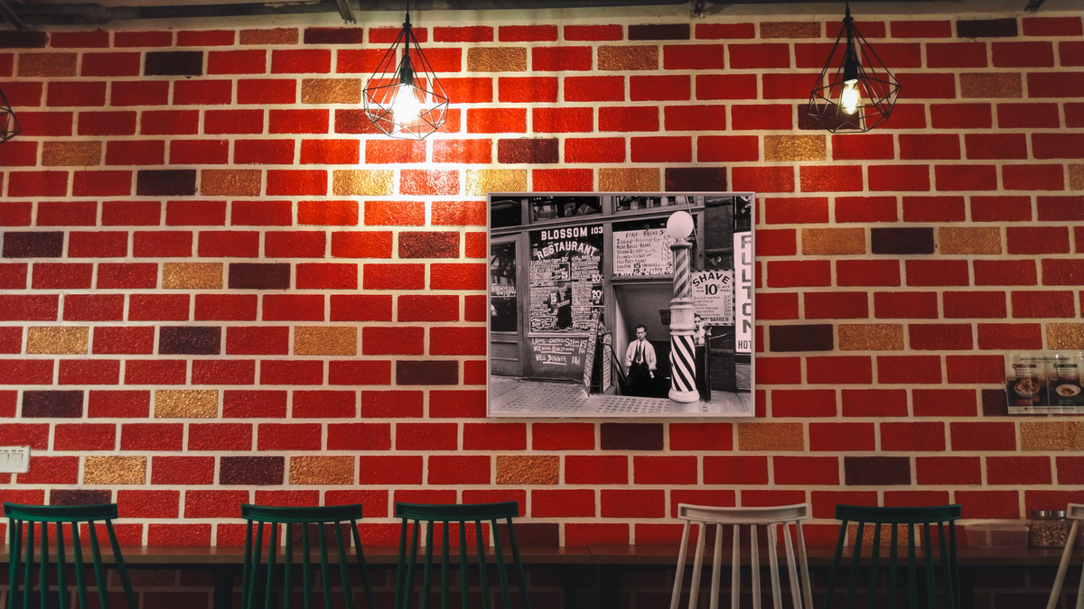 Blossom Restaurant, 103 Bowery, Manhattan by Berenice Abbott, shown at 32 × 40 in (81.3 × 101.6 cm) on canvas in Ramino Opaque White, restaurant