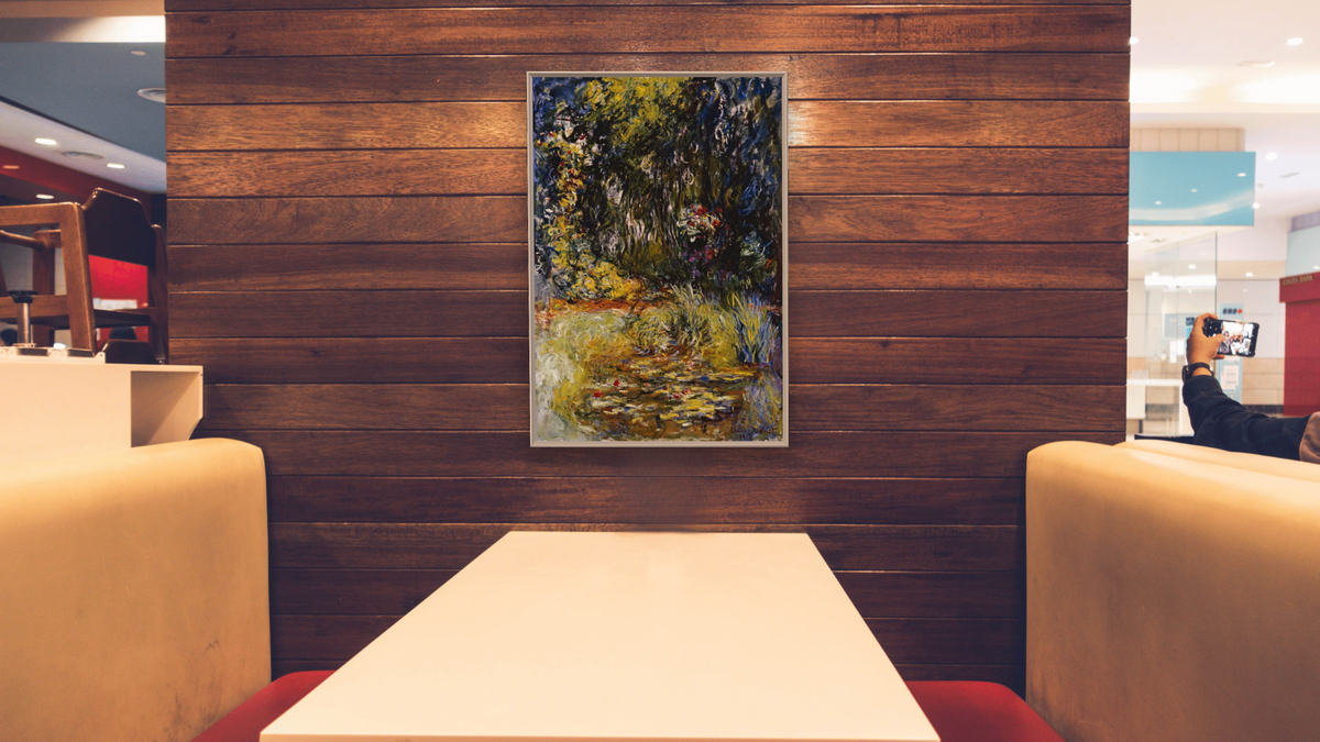 Corner of a Pond With Waterlilies by Claude Monet, shown at 28 × 42 in (71.1 × 106.7 cm) on canvas in Ramino Opaque White, restaurant