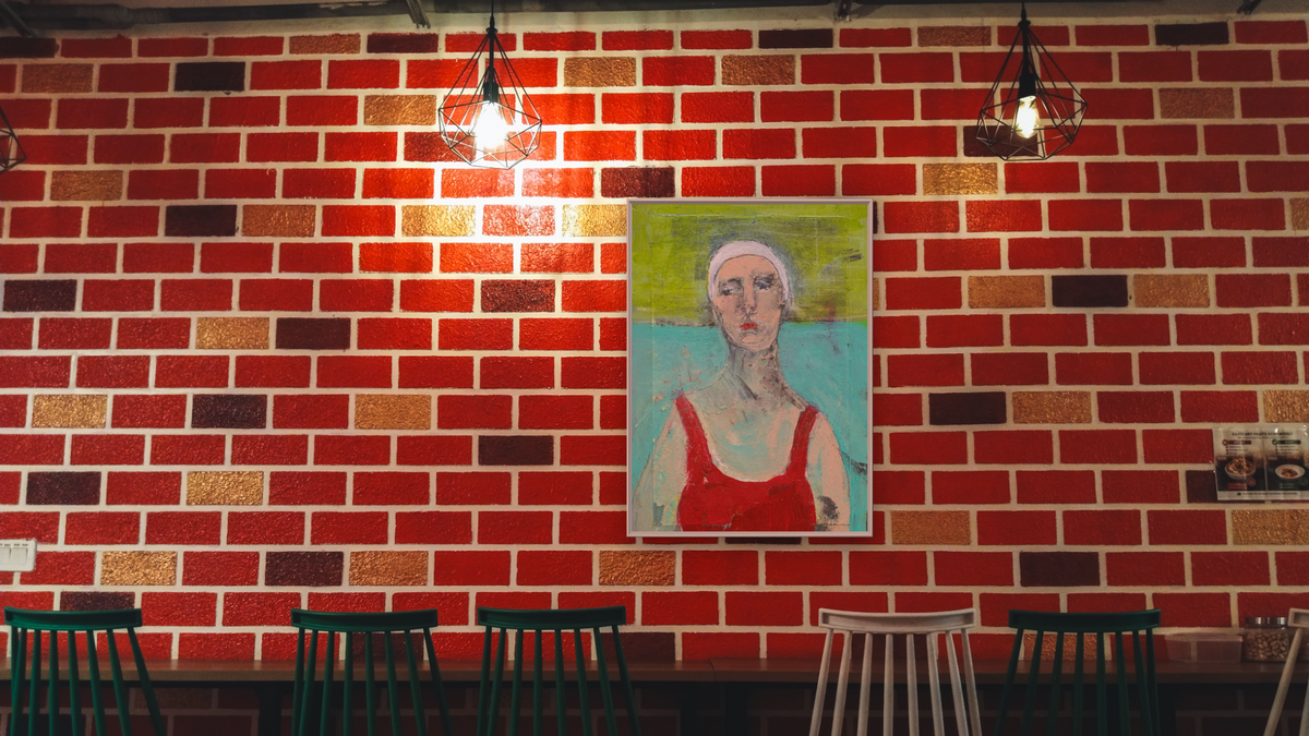 Don't You Dare by Dobee Snowber, shown at 30 × 40 in (76.2 × 101.6 cm) on canvas in Ramino Opaque White, restaurant