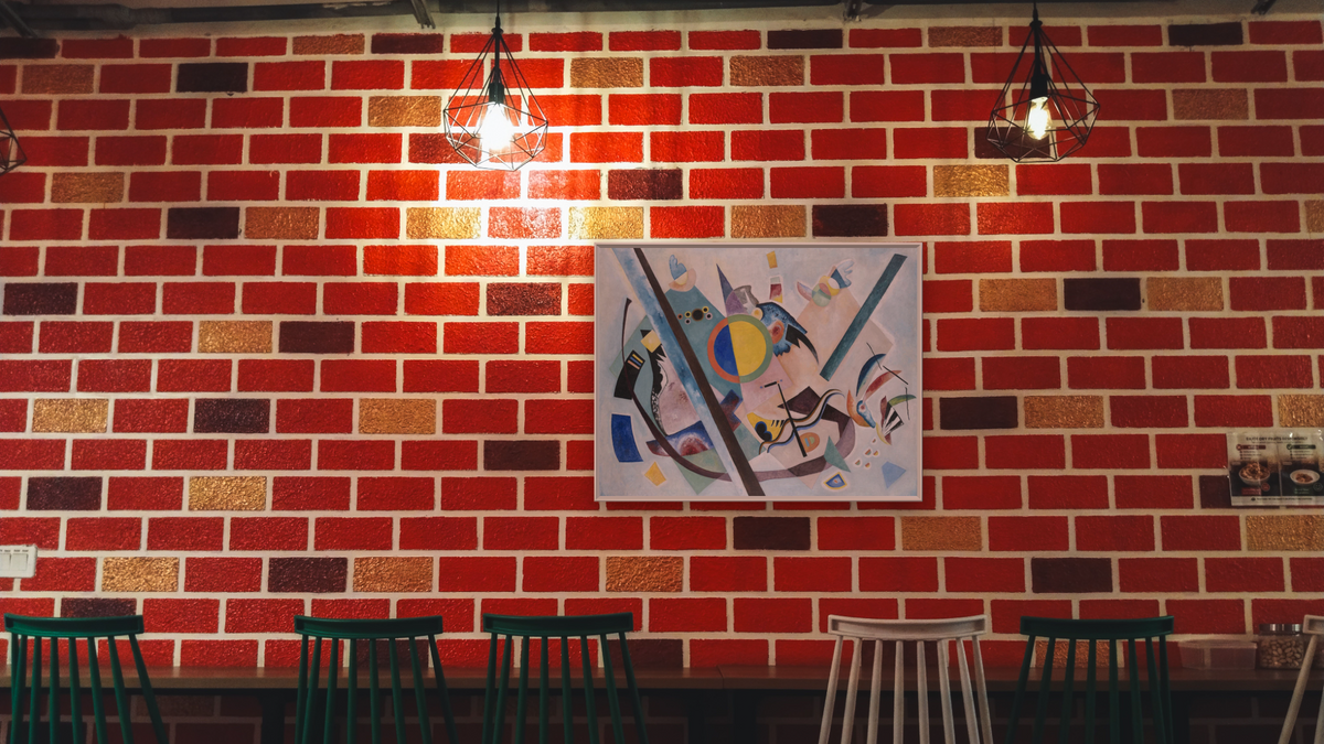 Multicolored Circle by Wassily Kandinsky, shown at 30 × 40 in (76.2 × 101.6 cm) on canvas in Ramino Opaque White, restaurant