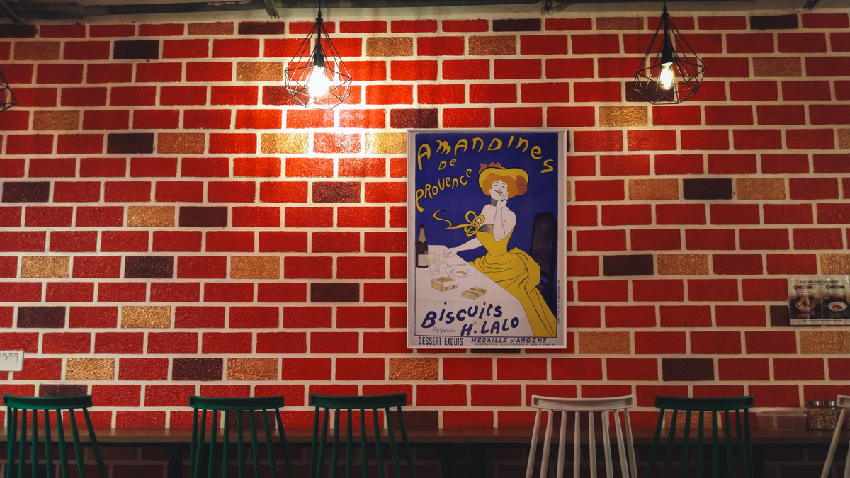 Amandines de Provence poster by Leonetto Cappiello, shown at 30 × 40 in (76.2 × 101.6 cm) on canvas in Ramino Opaque White, restaurant