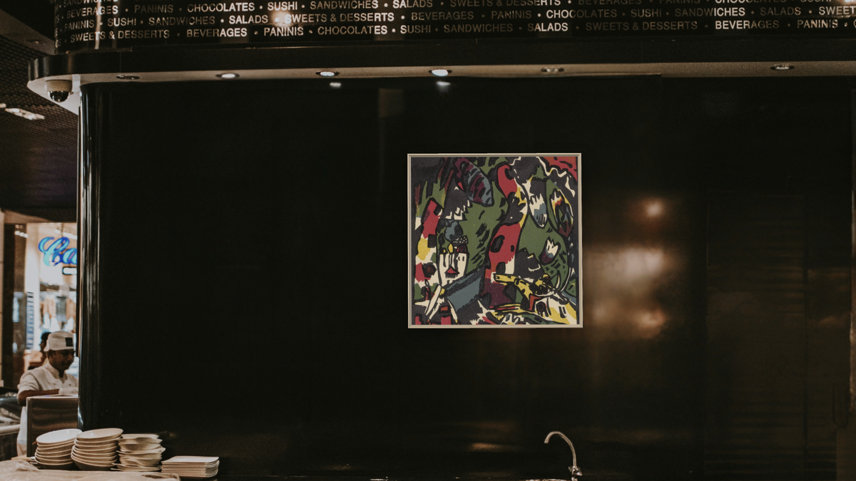 The Archer, shown at 32 × 32 in (81.3 × 81.3 cm) on canvas in Ramino Opaque White, restaurant