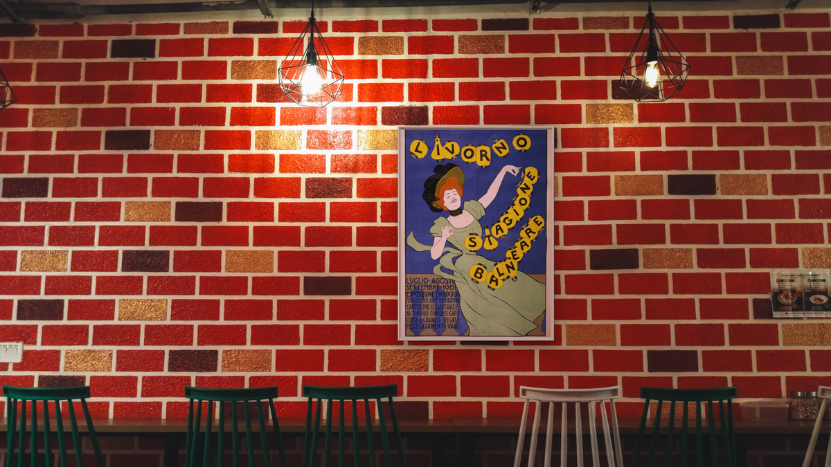 Livorno Stagione Balneare poster by Leonetto Cappiello, shown at 30 × 40 in (76.2 × 101.6 cm) on canvas in Ramino Opaque White, restaurant