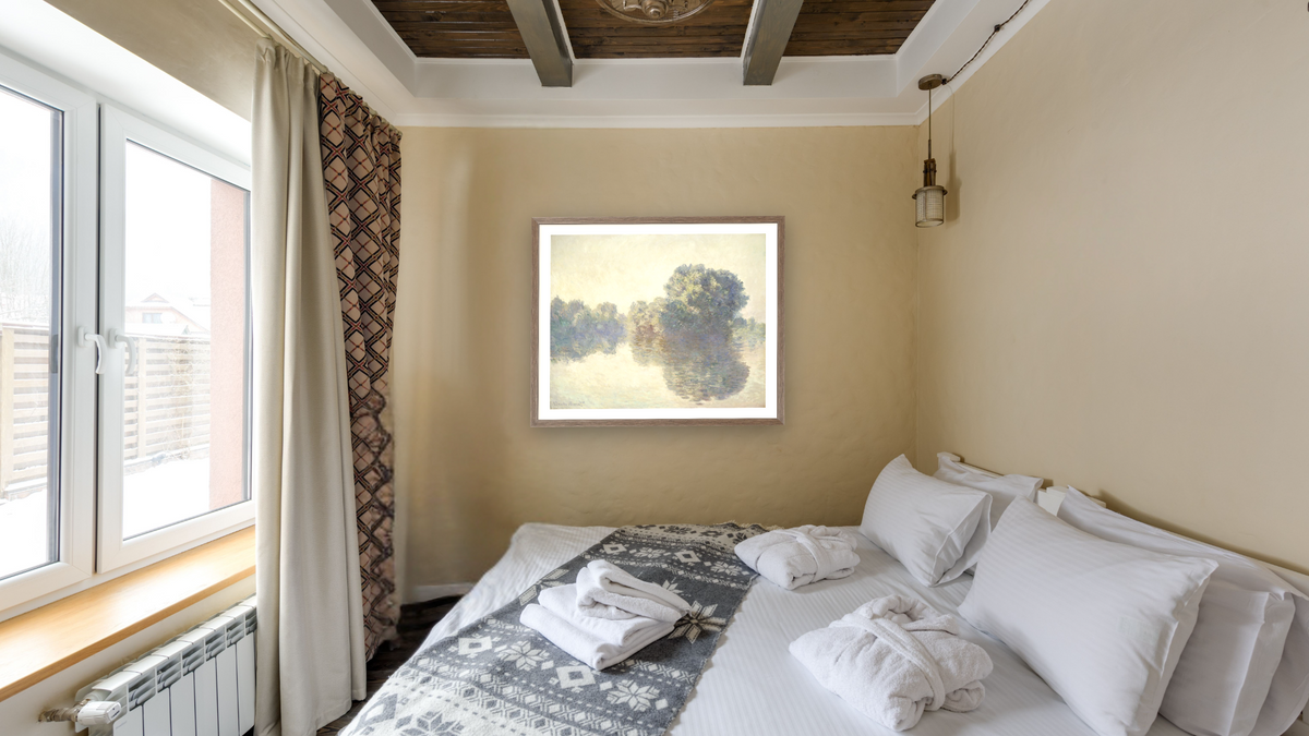 The Seine at Giverny by Claude Monet, shown at 32 × 40 in (81.3 × 101.6 cm) in Arber Light Walnut, hotel guest room