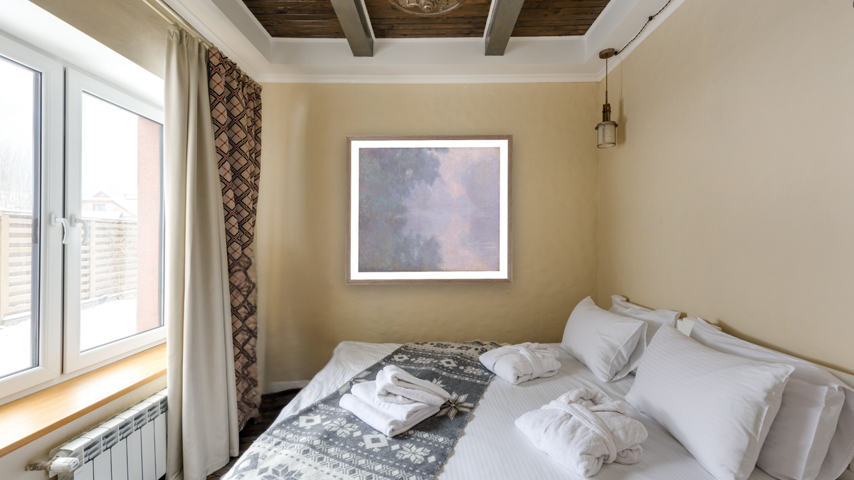 Morning on the Seine, Giverny (Matinée sur la Seine) by Claude Monet, shown at 35 × 40 in (88.9 × 101.6 cm) in Arber Light Walnut, hotel guest room
